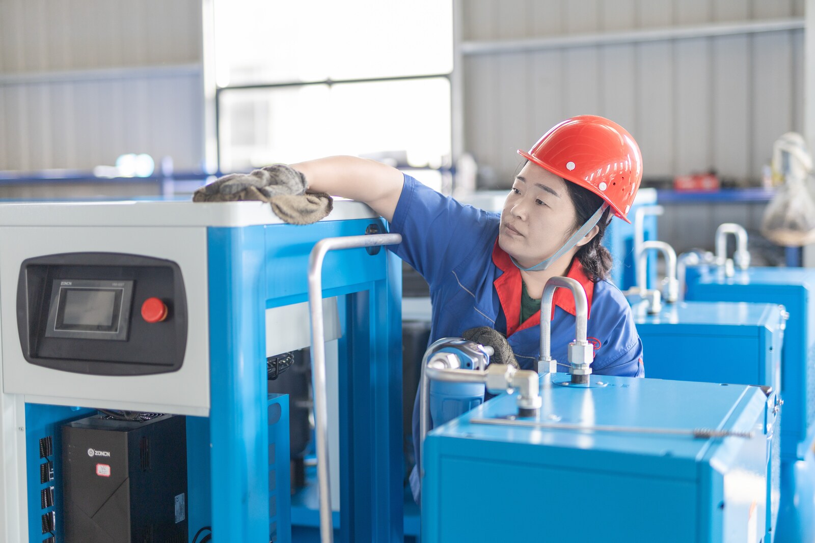 Dazhang technician inspecting industrial equipment